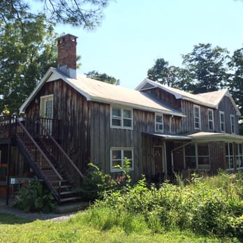 Eger Bros - a large wooden house with a staircase leading up to it - Fruits & Veggies Near Me - Hudson, New York Eger Bros - a large wooden house with a staircase leading up to it - Fruits & Veggies Near Me - Hudson, New York