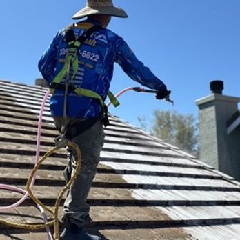 Delta Softwash - Roof being treated during a softwash service. - Pressure Washers Near Me - Lodi, California Delta Softwash - Roof being treated during a softwash service. - Pressure Washers Near Me - Lodi, California