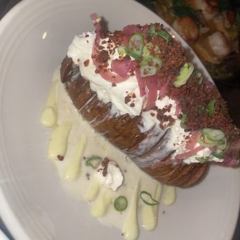 Scales - Loaded Hasselback potato (the best baked potato I've ever had) - Seafood Near Me - Portland, Maine Scales - Loaded Hasselback potato (the best baked potato I've ever had) - Seafood Near Me - Portland, Maine