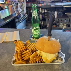 Symba's Pub & Grub - Cheese curd Burger, waffle fries and a sundrop