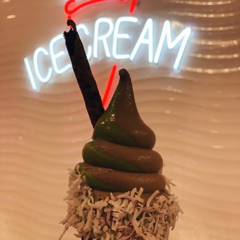 Fluffy Bear - matcha and oreo swirl in a charcoal cone, topped with coconut shavings and chocolate wafer - Ice Cream & Frozen Yogurt Near Me - Laguna Hills, California