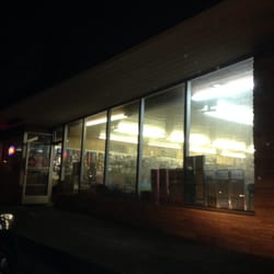 Plus 99 Cent Store - Store at night