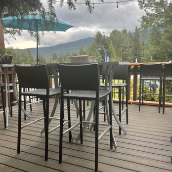 The Raven Room - Stools overlooking street - Cocktail Bars Near Me - Whistler, British Columbia