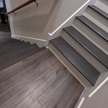 Armatino Contracting - Laminate flooring at landing that was used in rest of the house. - General Contractors Near Me