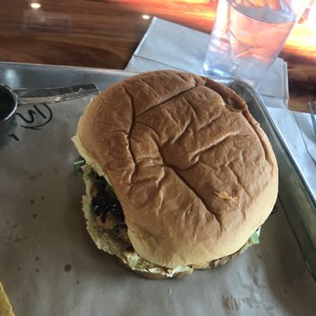 Industry - Their smoked salmon burger is SIZEABLE to start with--think I prefer their salmon bagels but this was tasty! - New American Near Me - San Marcos, Texas Industry - Their smoked salmon burger is SIZEABLE to start with--think I prefer their salmon bagels but this was tasty! - New American Near Me - San Marcos, Texas