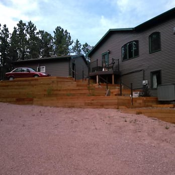 Black Hills Property Preservation - 6x6 treated timber walls.....a great combination for this home allowing homeowner to install new shrubs, flowers, etc at ther... - Gardeners Near Me Black Hills Property Preservation - 6x6 treated timber walls.....a great combination for this home allowing homeowner to install new shrubs, flowers, etc at ther... - Gardeners Near Me