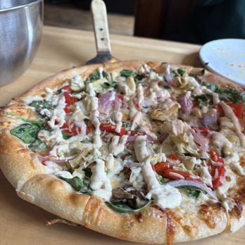 The Cosmos Wood-Fired Pizza - Pizza Near Me - Lansing, Michigan The Cosmos Wood-Fired Pizza - Pizza Near Me - Lansing, Michigan