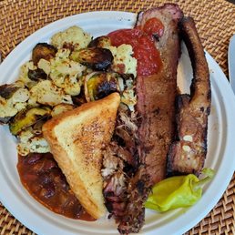 Mixed plate: Ribs, brisket and pulled pork with 4 sides and sauce, then we added oven-roasted vegetables.