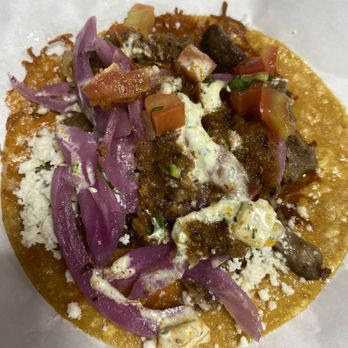 Santo Taco - SIRLOIN STK ASADA TACO (cheese added both cooked onto the tortilla and queso fresco)  (Plus toppings from the salsa bar) - Mexican Near Me - Salt Lake City, Utah