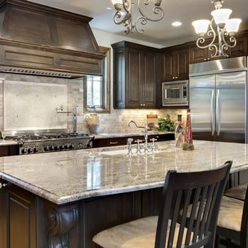 Going Granite - a large kitchen with a center island - General Contractors Near Me - Colorado Springs, Colorado Going Granite - a large kitchen with a center island - General Contractors Near Me - Colorado Springs, Colorado