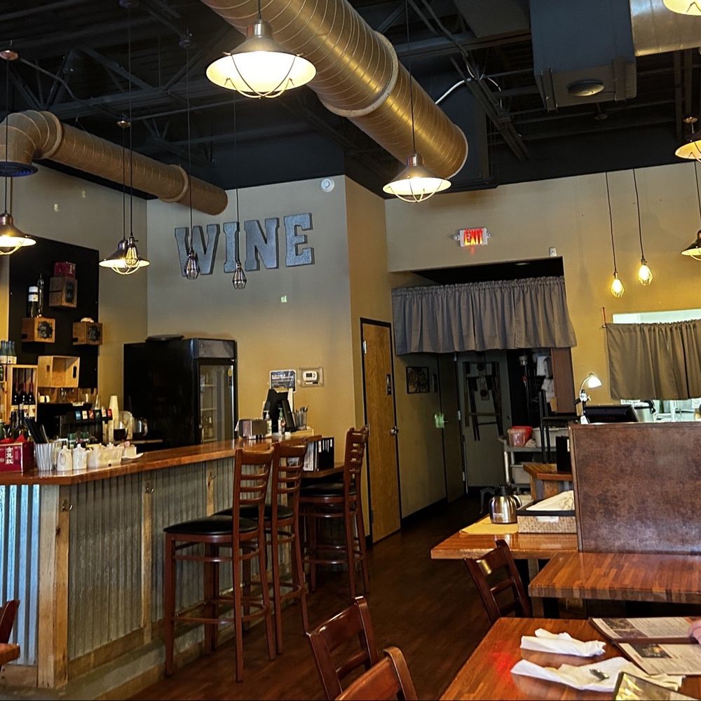 Customers and a bar. Customers and a bar.