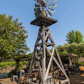 Tudal Winery - a windmill with a flag on top - Wineries Near Me - Saint Helena, California Tudal Winery - a windmill with a flag on top - Wineries Near Me - Saint Helena, California