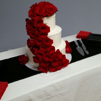 Exquisite Desserts - Our wedding cake with 3 dozen roses. Out of this world. - Bakeries Near Me - Palm Desert, California Exquisite Desserts - Our wedding cake with 3 dozen roses. Out of this world. - Bakeries Near Me - Palm Desert, California