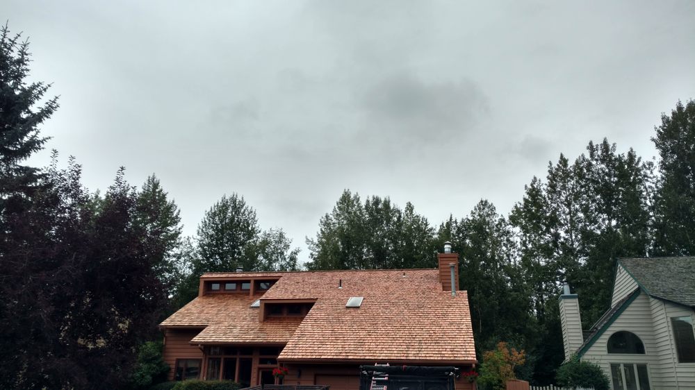 Slide of Action Roofing Services