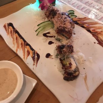 Sushi Bear - King Dragon served with a light bulb in its tail--- uniquely presented - Sushi Bars Near Me - Tustin, California Sushi Bear - King Dragon served with a light bulb in its tail--- uniquely presented - Sushi Bars Near Me - Tustin, California