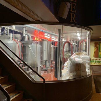 Northampton Brewery - View of the beer making factory from the bar room. Cool element of the restaurant! - Brewpubs Near Me - Northampton, Massachusetts Northampton Brewery - View of the beer making factory from the bar room. Cool element of the restaurant! - Brewpubs Near Me - Northampton, Massachusetts
