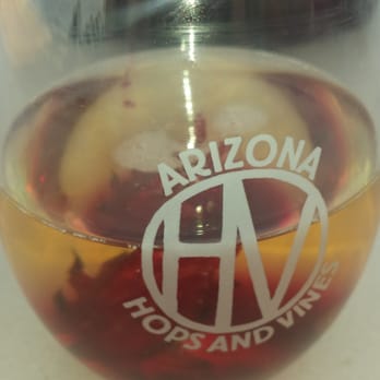 Sonoita Vineyards - Champagne with hibiscus flower... pretty yummy - Wine Bars Near Me - Elgin, Arizona