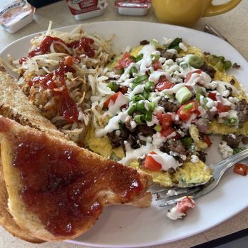 Scramblers - Scramblers Signature Sausage Frittata and sourdough Toast - Breakfast & Brunch Near Me - Columbus, Ohio Scramblers - Scramblers Signature Sausage Frittata and sourdough Toast - Breakfast & Brunch Near Me - Columbus, Ohio