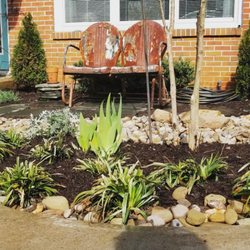 BRS Landscape & Design Services - Dry stream bed with sitting area.