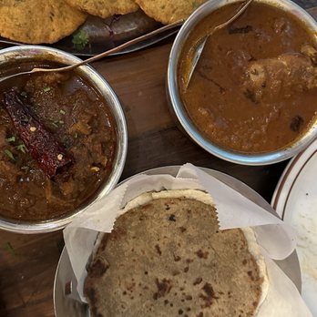 Swaraj India - Malvani chicken, kolhapuri mutton, bajri bhakri, rice bhakri and kombdi vade (it's served as only vade no chicken curry) - Indian Near Me - Santa Clara, California Swaraj India - Malvani chicken, kolhapuri mutton, bajri bhakri, rice bhakri and kombdi vade (it's served as only vade no chicken curry) - Indian Near Me - Santa Clara, California