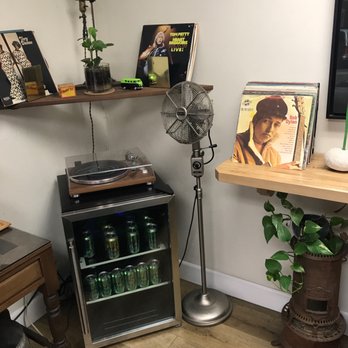 Just Smogs - Waiting area has sparking water & vintage vinyl! Love it! - Smog Check Stations Near Me - Huntington Beach, California Just Smogs - Waiting area has sparking water & vintage vinyl! Love it! - Smog Check Stations Near Me - Huntington Beach, California