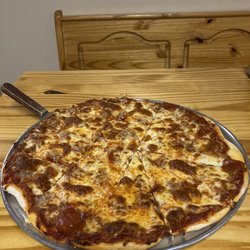 Carol Ann's Pizza - 1/2 pepperoni + 1/2 Italian Sausage & Pepperoni
