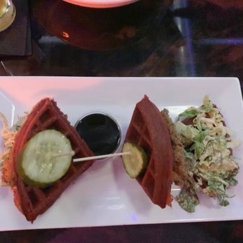 Therapy  - Red Velvet chicken waffle sandwich with maple syrup. - Bars Near Me - Las Vegas, Nevada