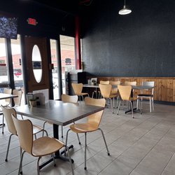 Sushi Go - Clean inside. Few tables and chairs.