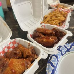 Bomber and hot bbq wings. Great flavor, can tell they're fresh! Fries are great as well