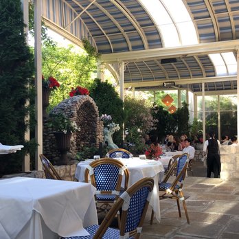 Auberge du Pommier - Patio, great place to spend a summer day evening in. - French Near Me - Toronto, Ontario