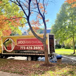 Moovers Chicago - Autumn move; truck, boxes, movers in a residential setting.
