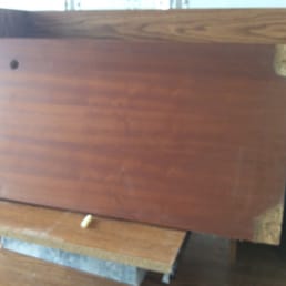 Top of a teak bookcase that was severely damaged. Top of a teak bookcase that was severely damaged.