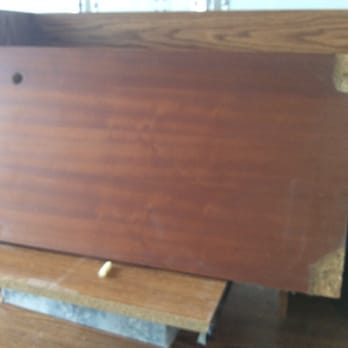 Purple People Movers - Top of a teak bookcase that was severely damaged. - Movers Near Me - Pinellas Park, Florida Purple People Movers - Top of a teak bookcase that was severely damaged. - Movers Near Me - Pinellas Park, Florida