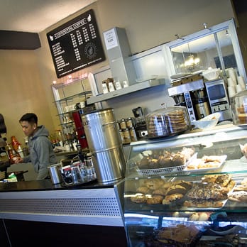 Continental Coffee - a man behind the counter of a coffee shop - Coffee & Tea Near Me - Vancouver, British Columbia Continental Coffee - a man behind the counter of a coffee shop - Coffee & Tea Near Me - Vancouver, British Columbia