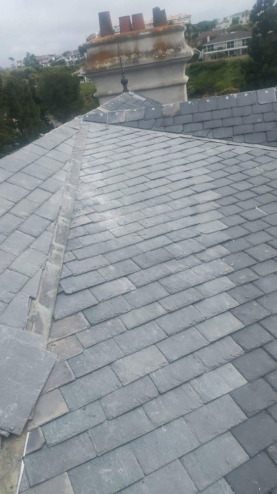 Slide of Ahn Top Roofing