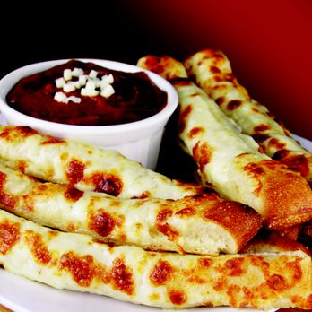 Husson's Pizza - cheesy breadsticks and dipping sauce - Pizza Near Me - South Charleston, West Virginia Husson's Pizza - cheesy breadsticks and dipping sauce - Pizza Near Me - South Charleston, West Virginia