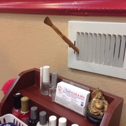 Nail brush holding the vent open in nail shop...
