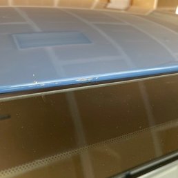 Paint scrapped off, top center of windshield Paint scrapped off, top center of windshield