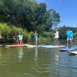 Kelley's Surf School - Hanapepe river paddleboarding with Kelly and his sons