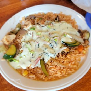 Molcajetes Lawrence - Chicken with queso and zucchini - Mexican Near Me - Lawrence, Kansas Molcajetes Lawrence - Chicken with queso and zucchini - Mexican Near Me - Lawrence, Kansas