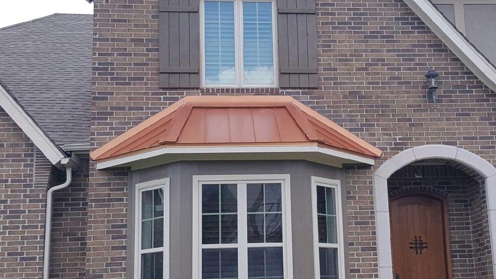 Slide of Tin Man Sheet Metal & Roofing