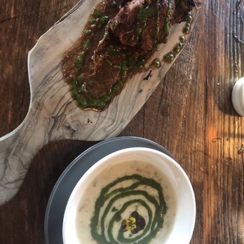 The Bradley Inn - Pork loin chop appetizer (spicy) and clam chowder - Hotels Near Me - New Harbor, Maine