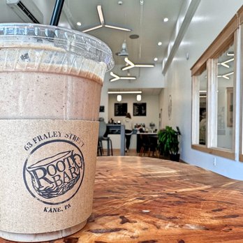 Root Bar - The Sparked Smoothie - coffee, almond milk, protein powder, banana, cacao and collagen. I just call it yummy. - Coffee & Tea Near Me - Kane, Pennsylvania Root Bar - The Sparked Smoothie - coffee, almond milk, protein powder, banana, cacao and collagen. I just call it yummy. - Coffee & Tea Near Me - Kane, Pennsylvania