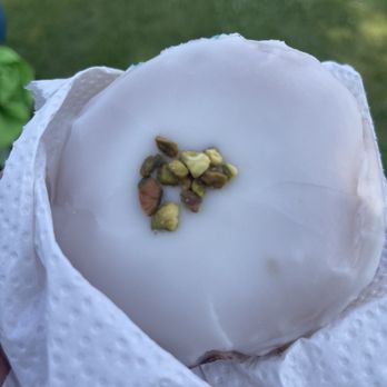 Oh Doughnuts - a white frosted doughnut with pistachios - Donuts Near Me - Winnipeg, Manitoba