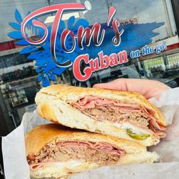 Exterior outside entrance of Tom's Cuban on the Go - My daughters Cuban sandwich - Ocala, Florida Exterior outside entrance of Tom's Cuban on the Go - My daughters Cuban sandwich - Ocala, Florida