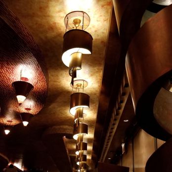 Vivere - a row of lamps hanging from the ceiling - Italian Near Me - Chicago, Illinois