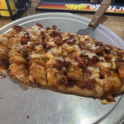 The Score Sports Grille - Peach, bacon, chicken flatbread with hot honey