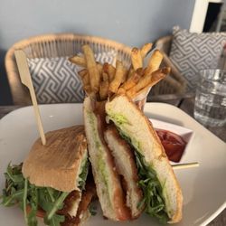 The Grove - Crispy Chicken Sandwich ($17). Pesto Mayo, Mozzarella, Tomato, Arugula, Pressed Hard Roll.  Very good.