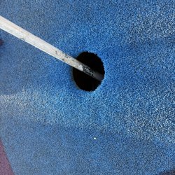 Pixar Putt - Holes were often broken, and the pole would be in the way