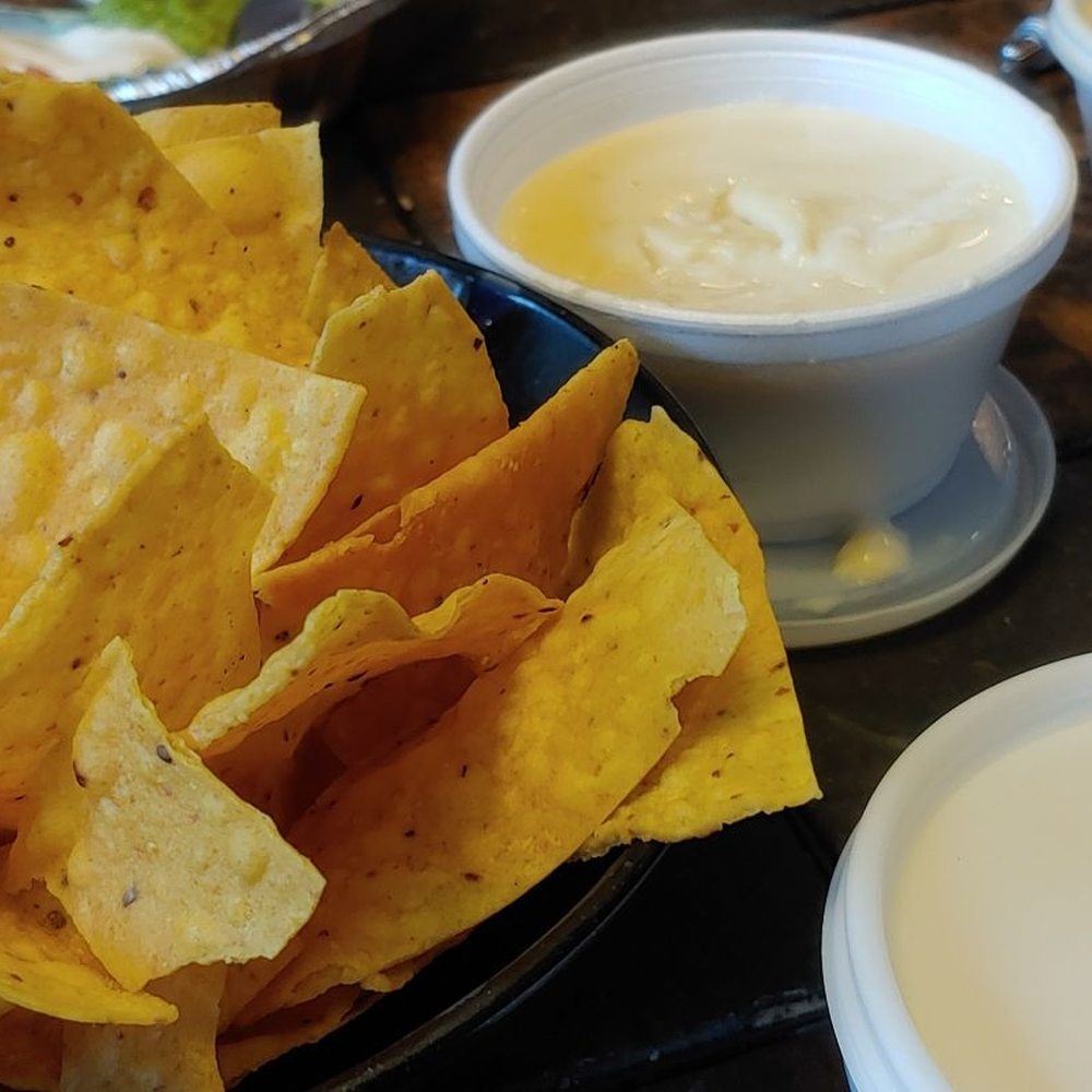 El Metate Mexican Restaurant - Queso dip & salsa with homemade chips - Mexican Near Me - Hixson, Tennessee